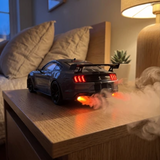 Turbo Haze on a nightstand with exhaust mist